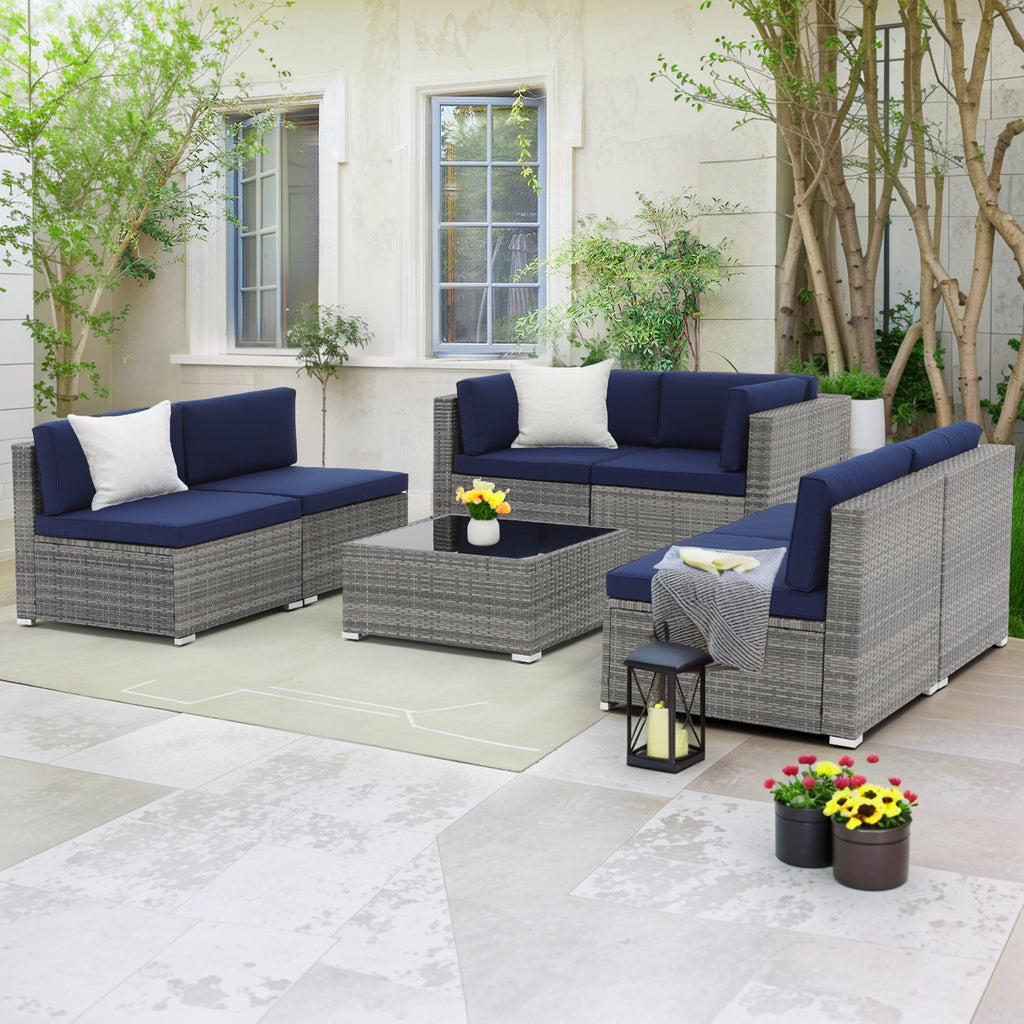 7 Piece Gray Rattan Patio Set with Coffee Table and Cushions Z593536